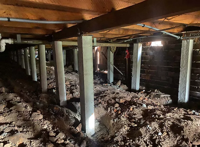 Subfloor with new concrete stumps and temporary supports – underpinning and reblocking in Anglesea