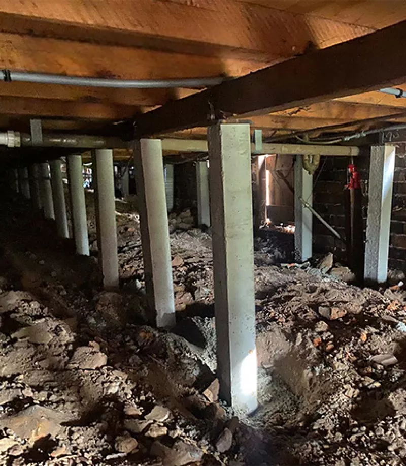 New concrete stumps supporting bearers under a timber floor – underpinning and reblocking in Portarlington